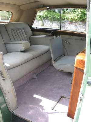  of the front and back seats, plus another photo of the back seat.